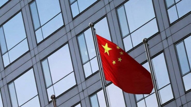 A Chinese flag flutters outside the China Securities Regulatory Commission (CSRC) building on the Financial Street in Beijing, China February 8, 2024.